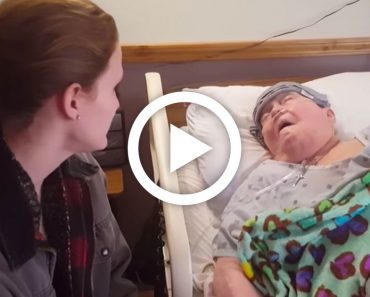 Nurse watches over dying patient. Then camera captures her beautifully singing a final hymn