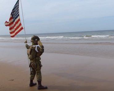 11-Year-Old Boy Stands On The Beach In Salute – Then Who Joins Him Moved Everyone To Tears