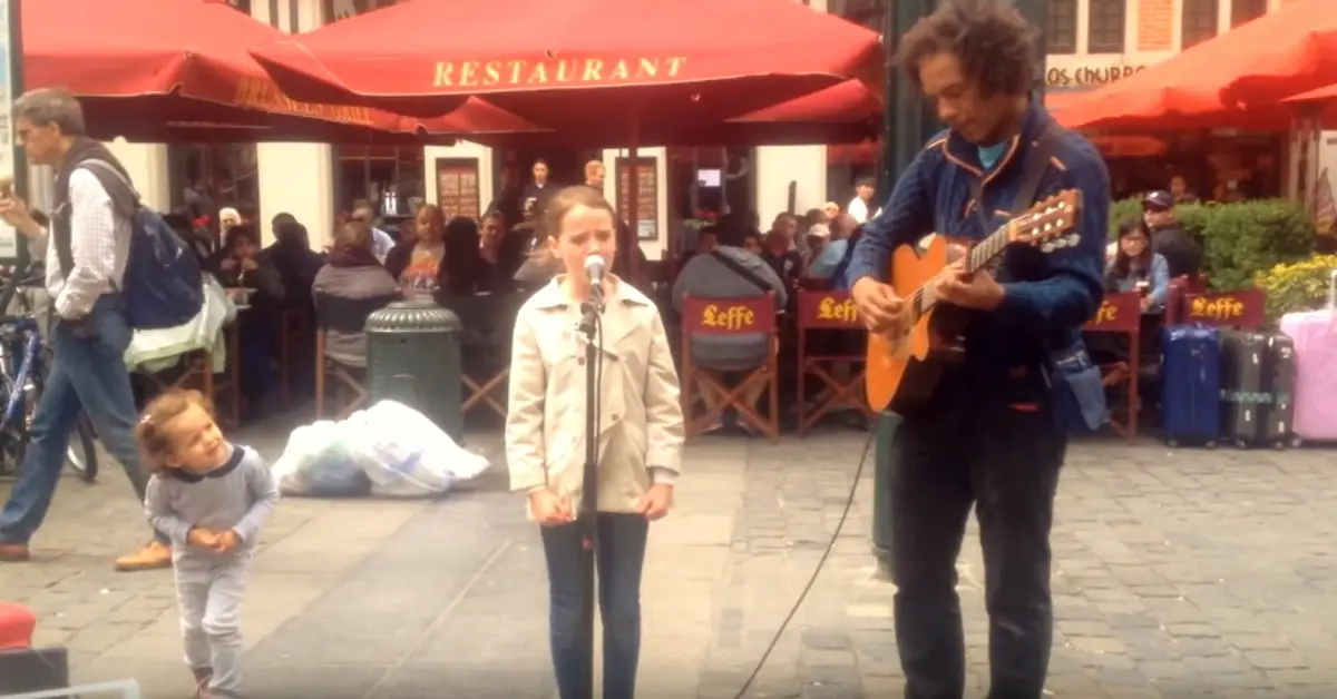 Young Girl Joins Street Performer To Sing ‘Ave Maria.’ When She Opens Her Mouth, Instant Chills