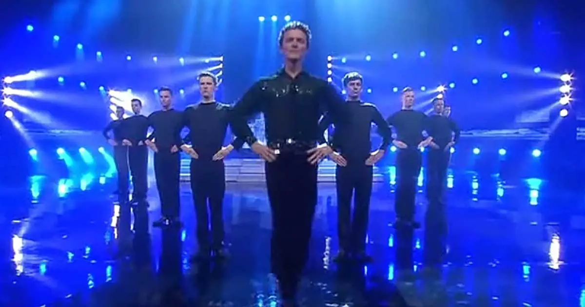 9 Men Line Up to Dance. But Watch Man in Front When Women with Drums Come Out