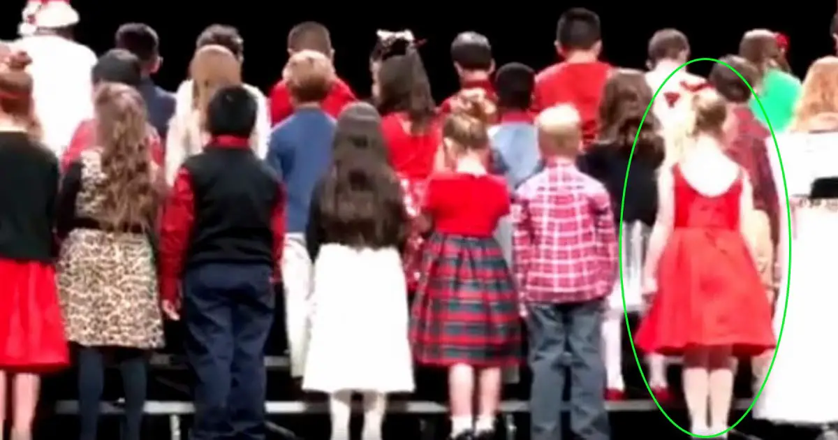 Kids Line Up Onstage. When They Turn Around, Girl In Red Dress Has Audience Rolling In Laughter