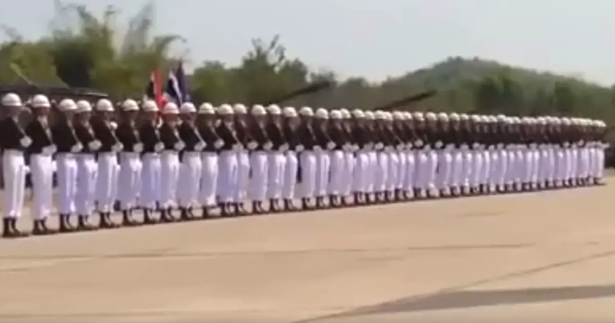 Dozens of Soldiers Line Up in Unison, But Watch as Man On Far Left Jumps Up In The Air